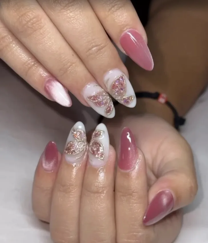 Mauve nails with pink glitter and marble details